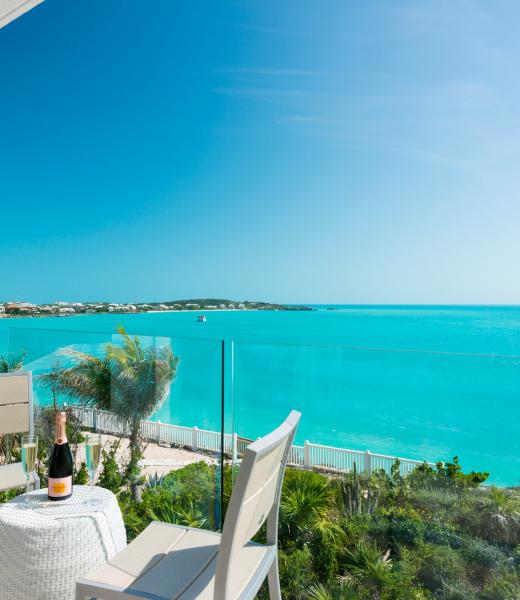 Villa Sol y Luna is a contemporary, oceanfront architectural masterpiece, providing the opportunity for true indoor/outdoor living for your Turks and Caicos vacation. There are nearly 25 feet of unscreened sliding glass doors along the ocean side of this Turks and Caicos villa that can be opened at your discretion to the infinity pool, deck,...