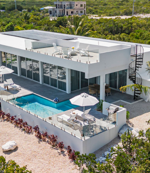 Caicos Breeze is a three-bedroom, three-bath modern designed Turks and Caicos villa located in the quiet Karaya Blue community.  This newly built villa embraces indoor-outdoor living with its 