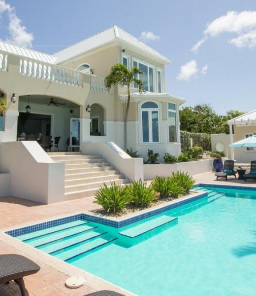 A 4000 sq. ft. Mediterranean styled palace in the sun, this four bedroom Three Cays Villa with 150 feet of water frontage has brand new stainless steel appliances, living, and bedroom furniture. The views from this Turks and Caicos villa in the tropics are endless and are some of the best on the island. Three Cays Villa's master bedroom has...